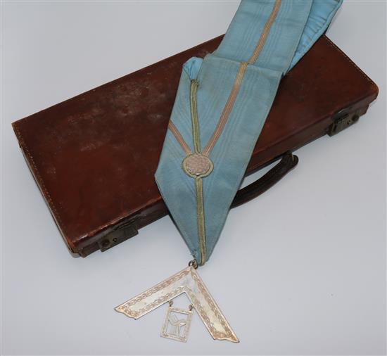 2 leather cases of Masonic memorabilia, silver medals, etc(-)